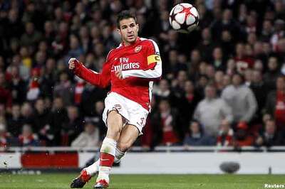 Fabregas will return to Barca, says Messi