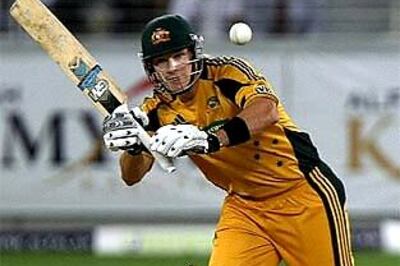 Hussey fifty guides Australia to 229 | Score
