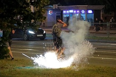 New clashes as opposition leader flees Belarus citing children's safety