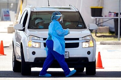 Testing drops in Texas, as schools reopen, football resumes