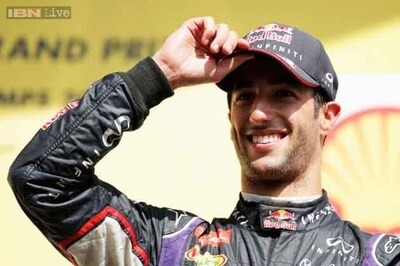 Beaming Ricciardo looms large in Mercedes' mirrors