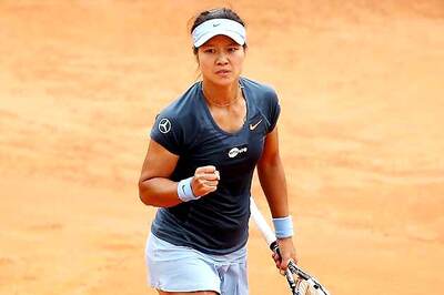 Li Na fights past Anabel Garrigues to reach second round in Paris