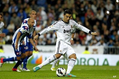 Ronaldo hat-trick leads Madrid rout of Deportivo