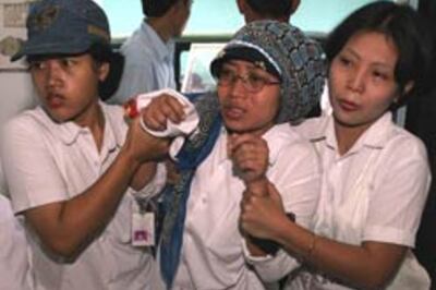 4,300 dead, Indonesia struggles to heal