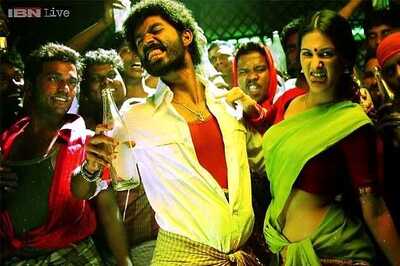 Is Dhanush playing the role of a slum chieftain in Balaji Mohan's 'Maari'?