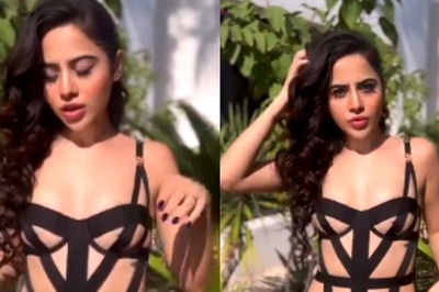 Urfi Javed Poses In Sexy Swimsuit Made Of Fabric Strips Amid Legal Trouble; Pens Note for Haters