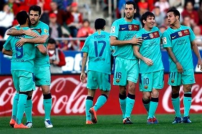 Messi scores again as 10-man Barca win