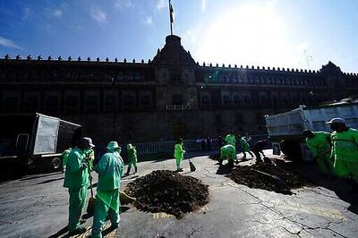 Relatives Of Mexico Missing Simulate Secret Graves In Plaza